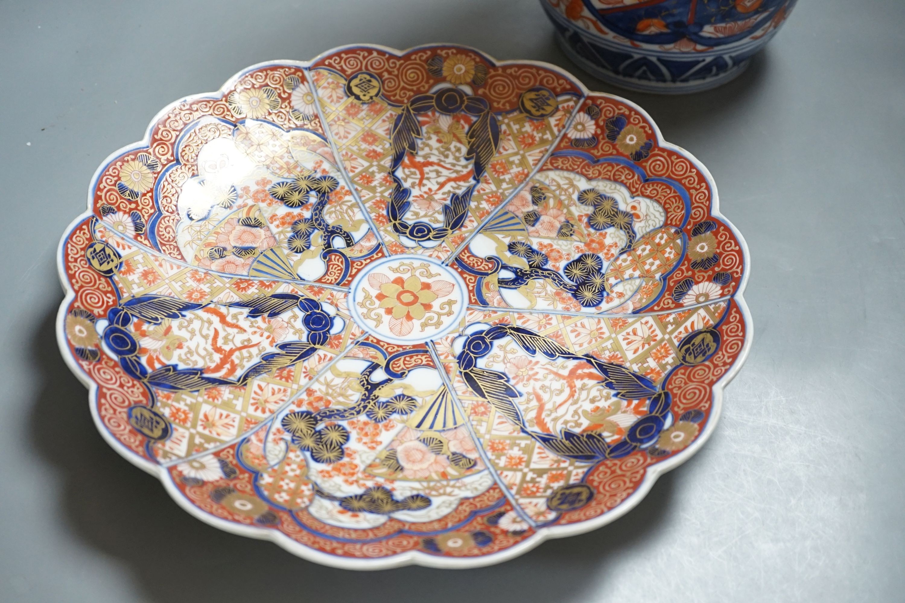 A Japanese Imari vase, 31cm tall, and an Imari dish, both Meiji period